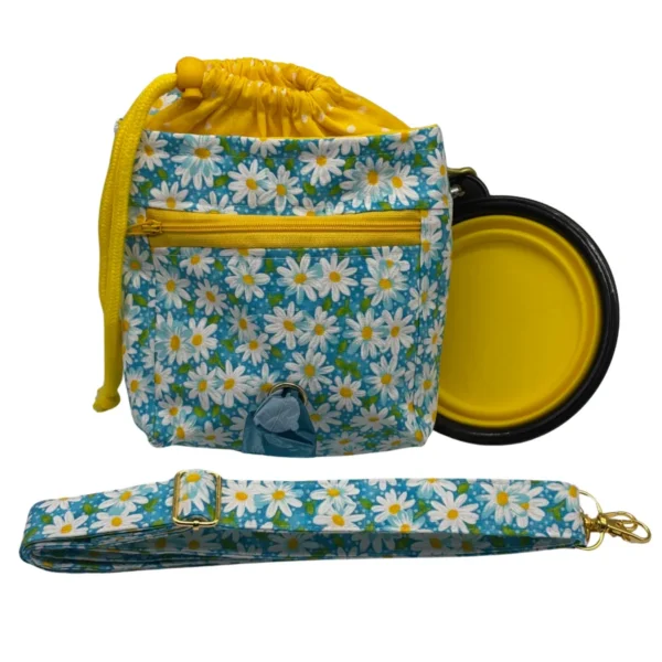 Floral drawstring bag with yellow collapsible bowl.