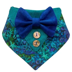 Colorful floral bandana with blue bow and buttons.